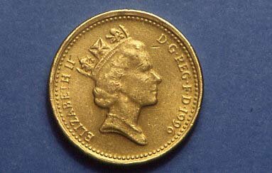 Obverse side of a 1996 dated brass
 counterfeit